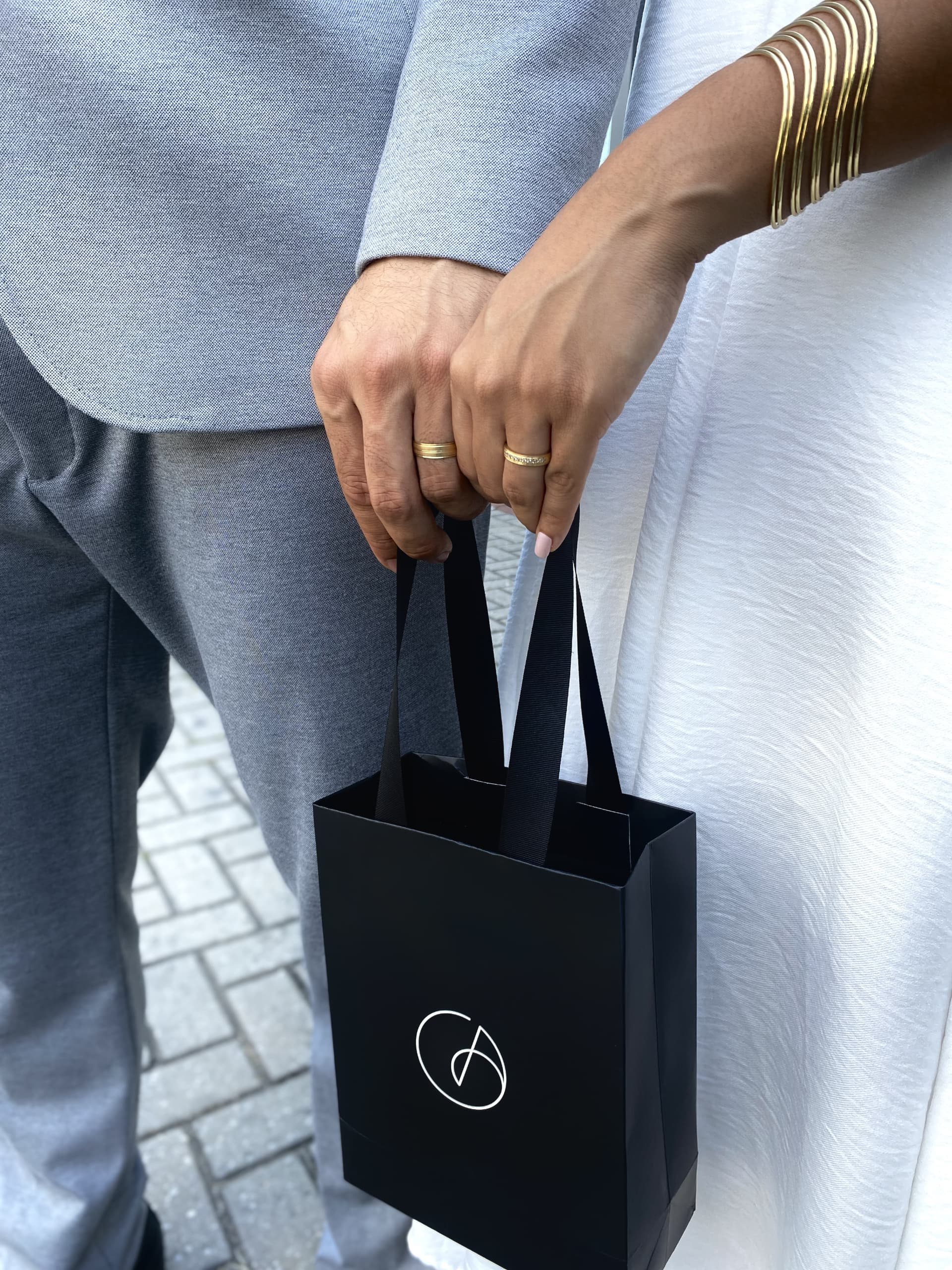 Couple with Avrati jewelry bag